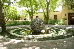 Driftwood globe garden feature in South Africa Driftwood globe garden feature in South Africa